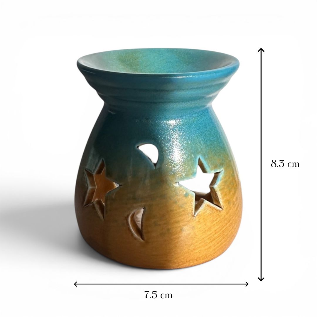 Ceramic oil burner with star and moon cutouts, shown with measurements on a white background.