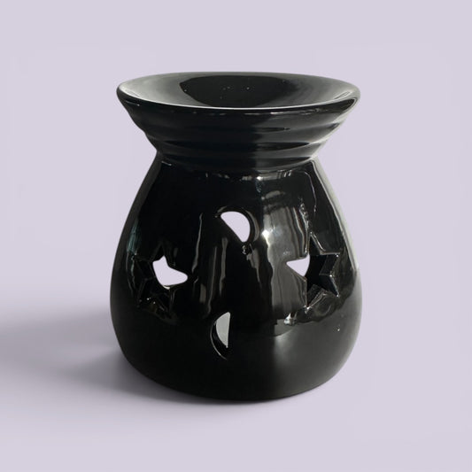 Midnight Star ceramic tealight burner in high-gloss black with star and moon cut-outs